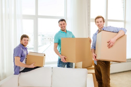 Professional movers packing and loading boxes in Tottenham