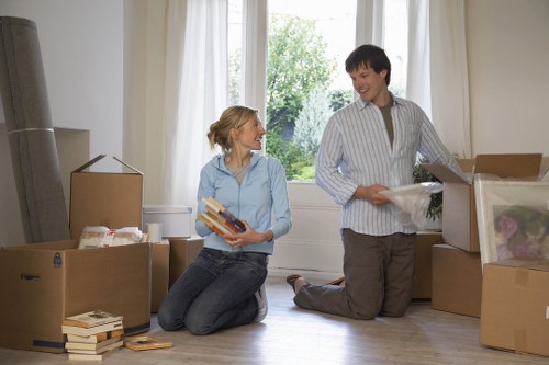 Unpacking service arranging household items in a Tottenham home
